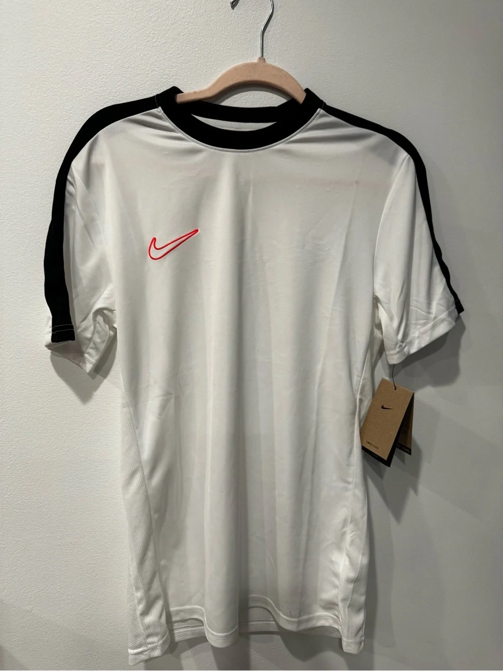 Nike Men’s White Short-Sleeve Training Shirt with Black Trim and Red Swoosh